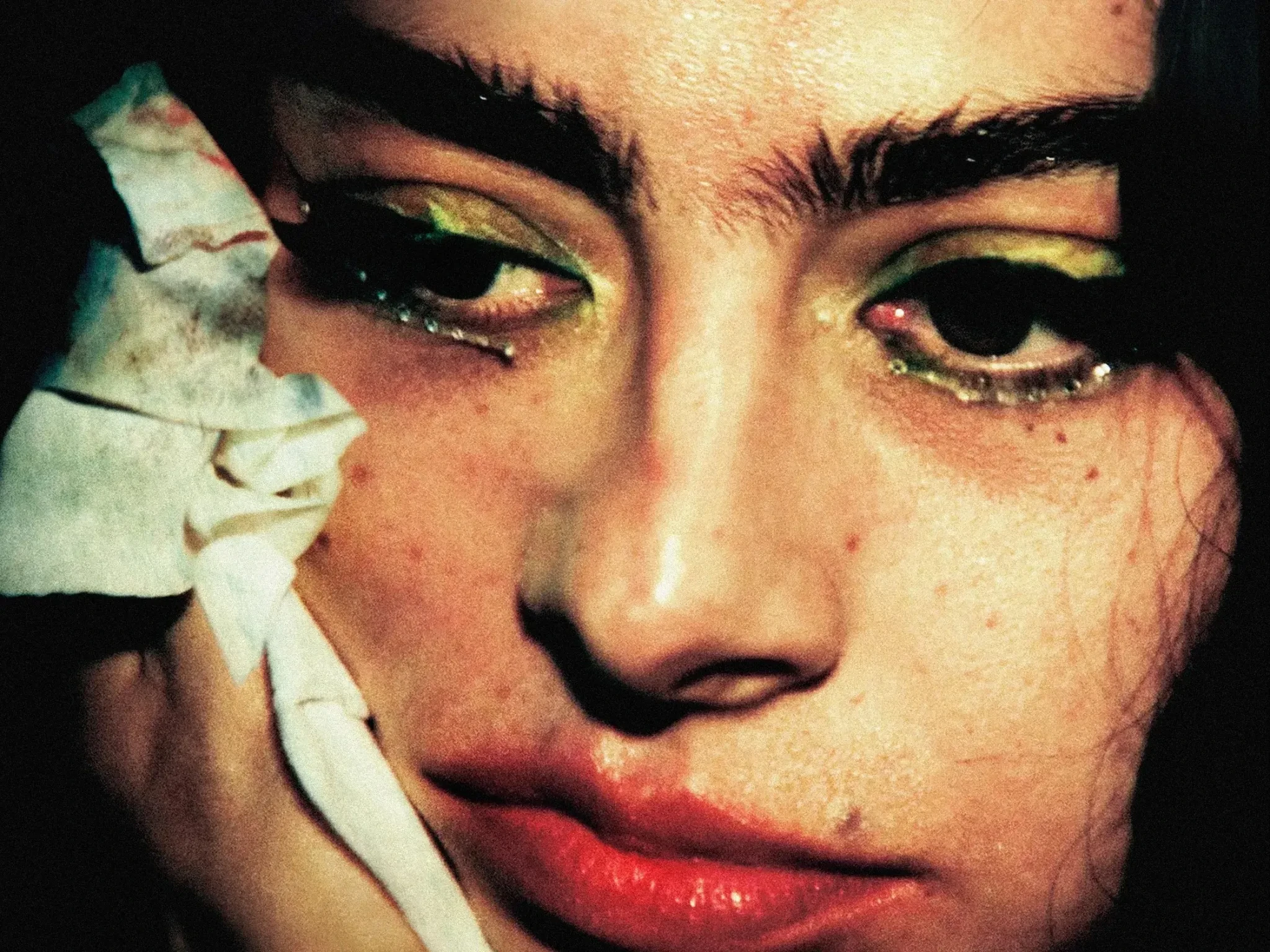 Close-up still of Charli XCX in The Moment (2026).