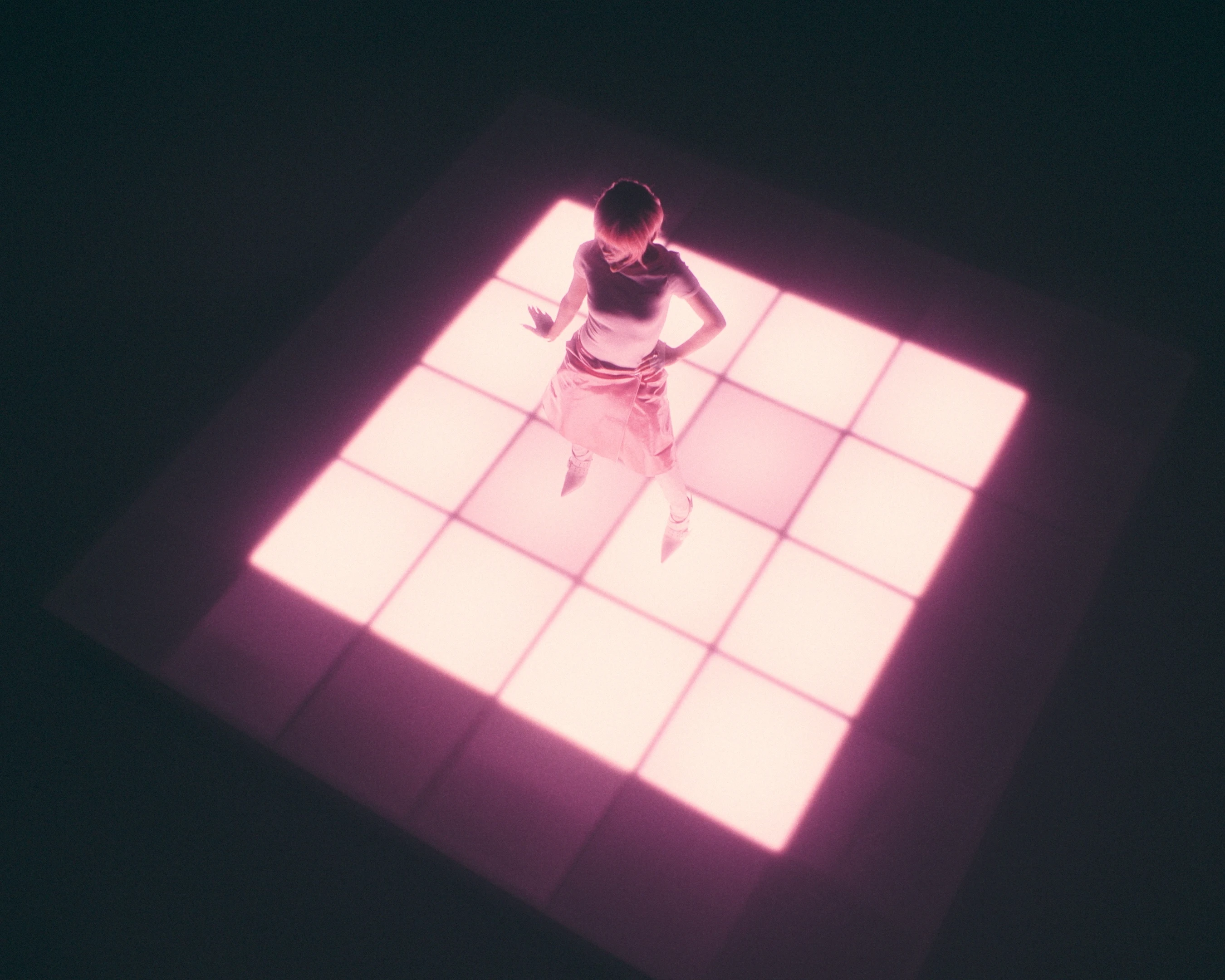 Lexie Liu dancing on glowing pink LED floor in Pop Girl music video directed by Aaron Deng