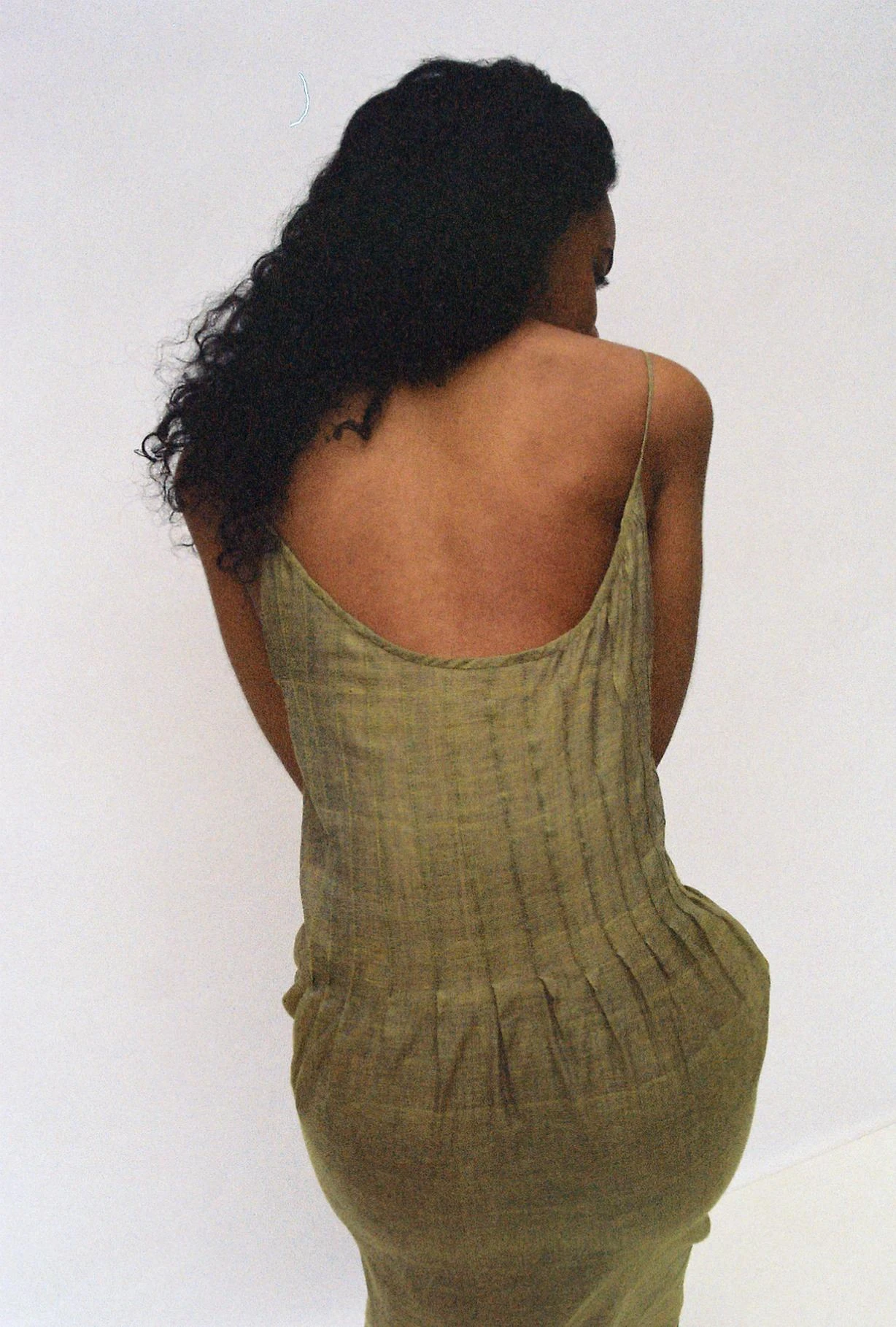 Asata Mais spring summer 2025 olive green linen slip dress with open back and spaghetti straps