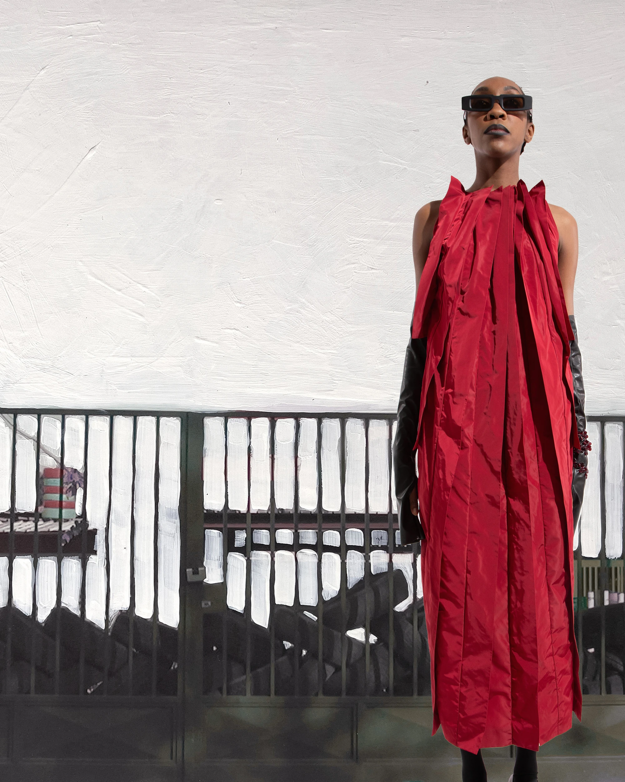 Maria Calderara F/W 24 Speaking Birds red sculptural draped gown with black leather gloves and rectangular sunglasses