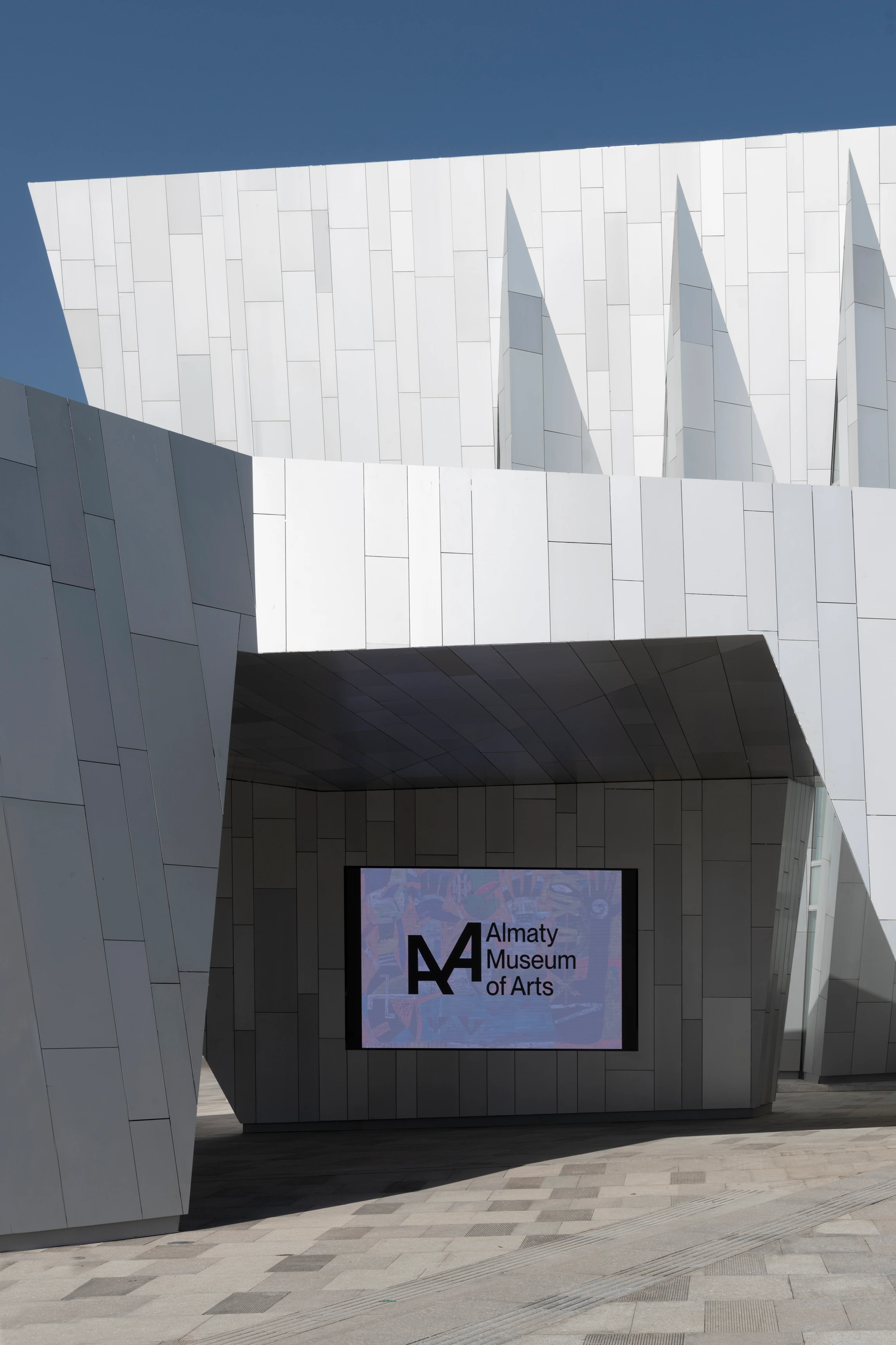 Almaty Museum of Arts exterior facade with angular white panels and dramatic geometric architecture