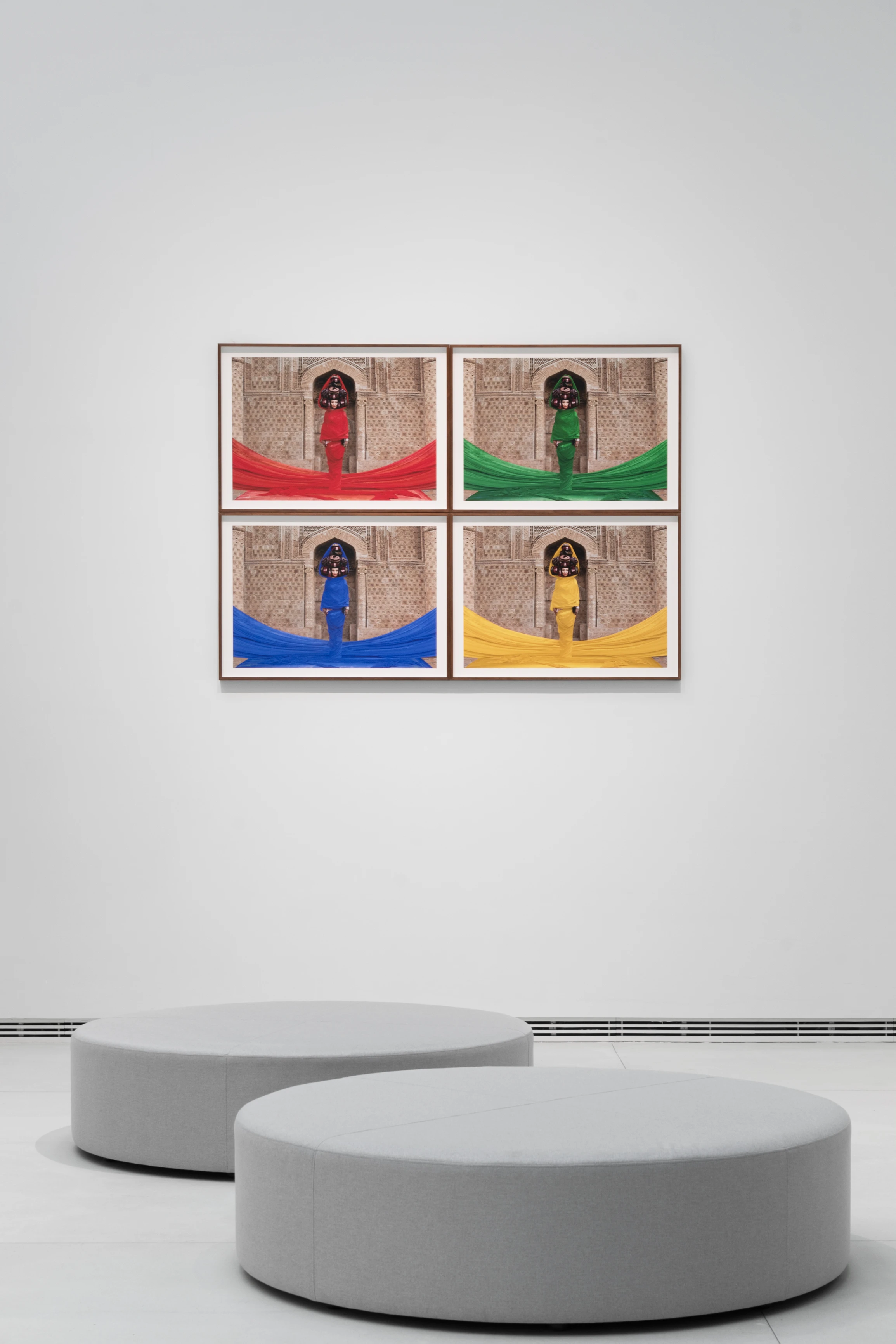 Four-panel photo series featuring vibrant red, green, blue, and yellow draped figures in ornate architectural niches, Almaty Museum of Arts