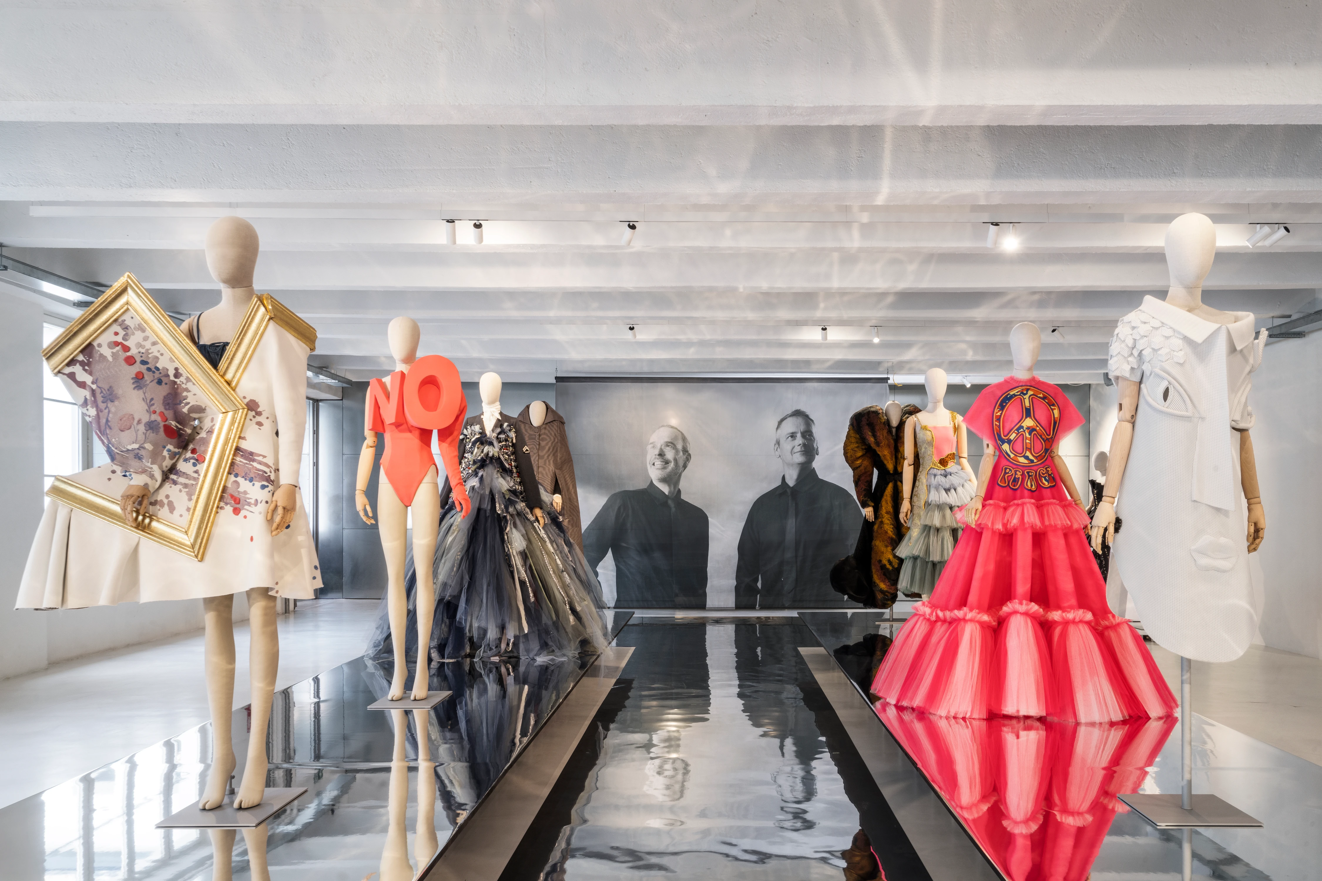 Viktor&Rolf Spectrum installation view at 10 Corso Como Milan featuring avant-garde gowns and sculptural fashion on mannequins