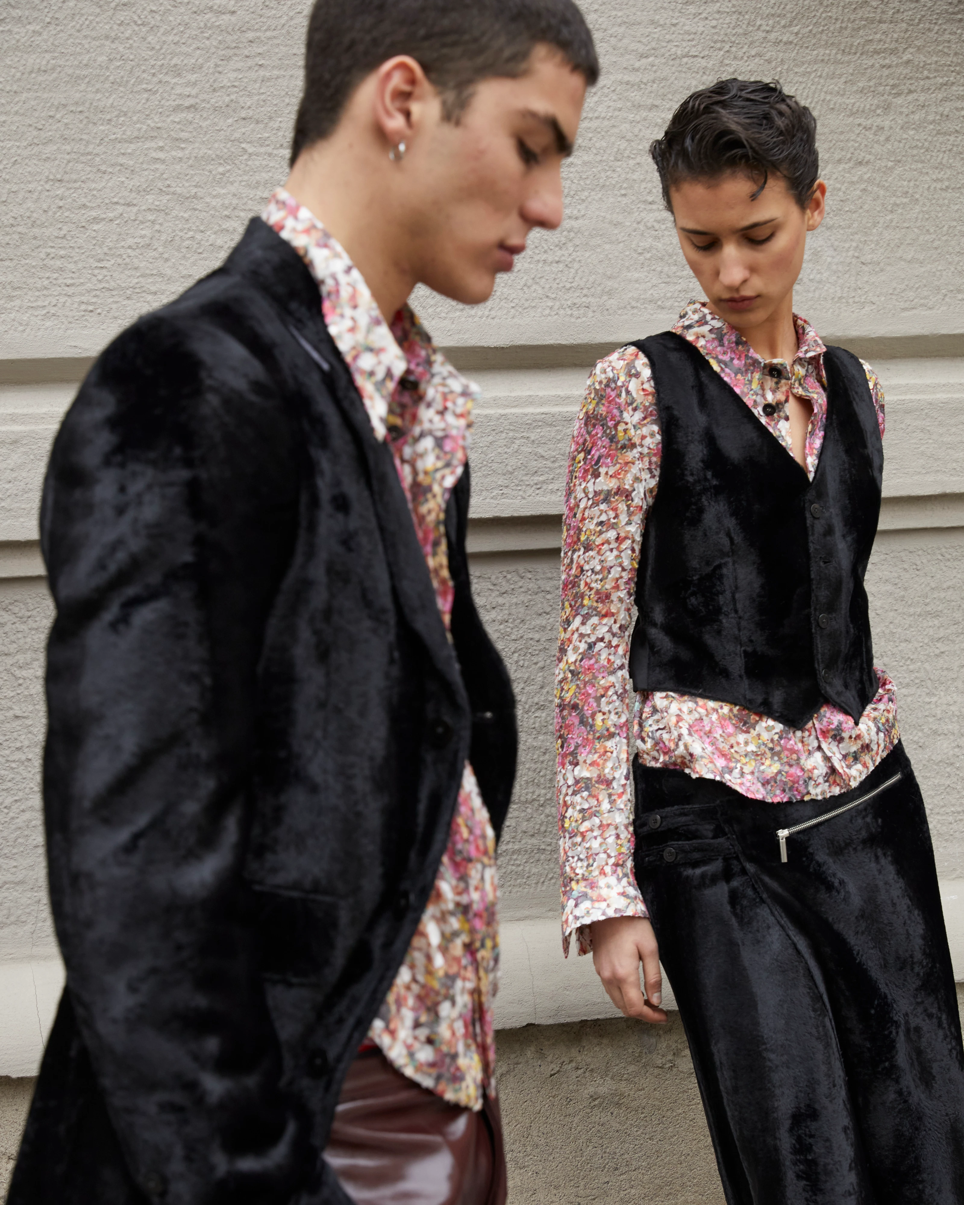 SAPIO FW25 two models in black velvet suiting with floral print shirts, luxury menswear editorial
